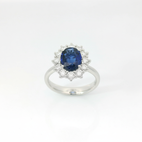 Ring sapphire oval halo clean background